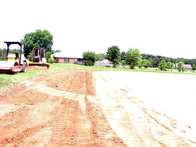 Front slope of the house ... will require more work for proper drainage..