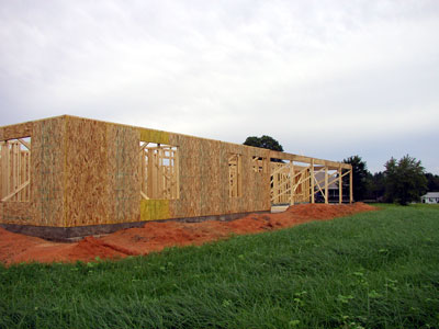 Rear of the house with porch beam and OSB sheathing...
