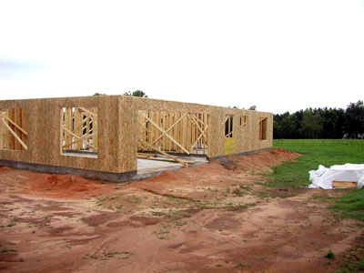 exterior of the house wrapped with OSB...