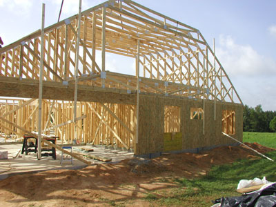 Good view to see how large a room these attic trusses will provide up stairs..
