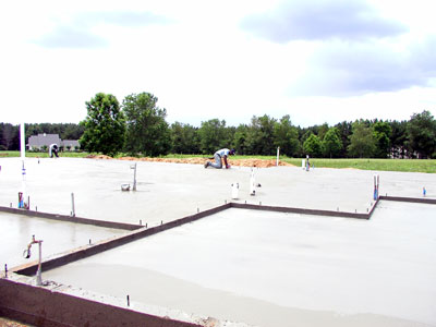 Placing the last touches on the freashly poured slab....
