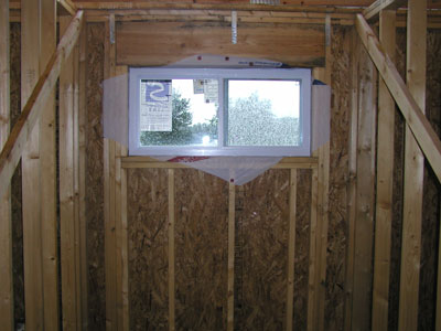 A bathroom window over the tub....