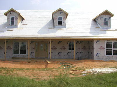Front of the house with Tyvek and flashing installed..