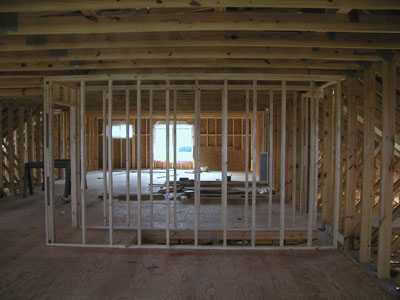 Framing the hallway up to the second floor...