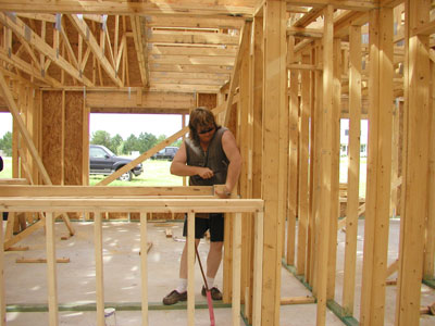 Working hard to make the tank is perfectly level...