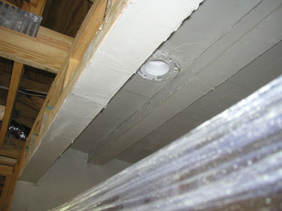 The hood on the tank with a coat of stucco...