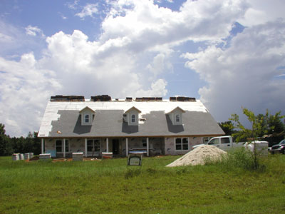 The roofers are finaly getting the roof on..