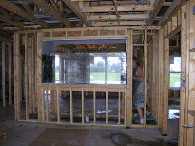 Working on notching out the studs so that the plumbing will work..