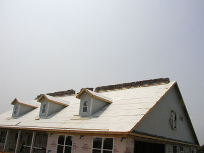 Asphat shingles stacked on the roof...