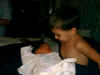 Daven holding sleeping Declynn