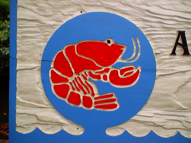 Photo of crayfish on
          sign